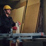 Carpenter male in a work place.